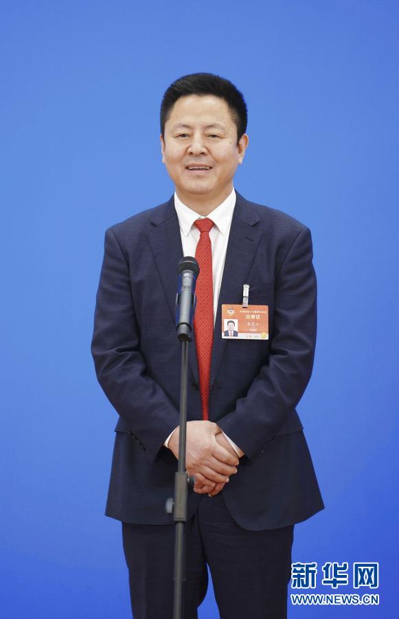 你的“命”，在我“心”上——兩次走上“委員通道”的敖虎山委員